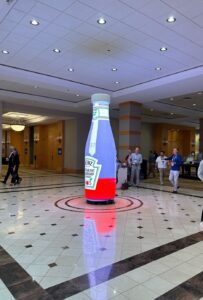 A giant LED Heinz ketchup bottle adorned the lobby of the conference and lit the way!
