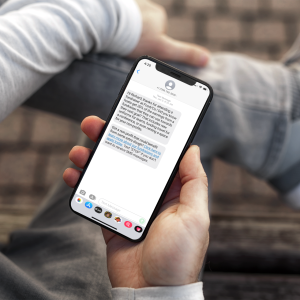 mockup-of-a-young-man-holding-an-iphone-11-pro-2130-el1